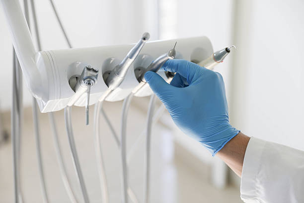 Professional Tooth Extraction technician working in North Lindenhurst, NY